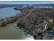 Aerial view displaying the home's location, water access, and mature trees at 8172 Summit Ridge Dr, Catawba, NC 28609