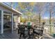 View of deck with table, chairs, and view of the lake at 8172 Summit Ridge Dr, Catawba, NC 28609