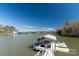 Picturesque waterfront view from the private boat dock, perfect for enjoying lake living at 8172 Summit Ridge Dr, Catawba, NC 28609