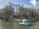 Picturesque waterfront home on a lush lot, complete with a private dock and boat lift at 8172 Summit Ridge Dr, Catawba, NC 28609