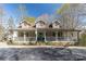 Charming home with a spacious front porch, stone accents, and a welcoming facade at 8172 Summit Ridge Dr, Catawba, NC 28609