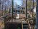 Stunning home with decks, a walk-down path, nestled among mature trees at 8172 Summit Ridge Dr, Catawba, NC 28609