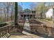 Stunning home with decks, a walk-down path, nestled among mature trees at 8172 Summit Ridge Dr, Catawba, NC 28609