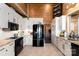 A bright kitchen features stainless appliances and tile backsplash at 8172 Summit Ridge Dr, Catawba, NC 28609