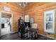 A spacious office showcases wood walls and natural light at 8172 Summit Ridge Dr, Catawba, NC 28609