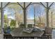 Scenic outdoor dining area with lake views and elegant architectural details at 8172 Summit Ridge Dr, Catawba, NC 28609