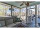 Screened-in porch featuring comfortable sofa and lake view at 8172 Summit Ridge Dr, Catawba, NC 28609