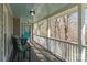 Relaxing covered porch with comfortable seating and scenic outdoor views at 8172 Summit Ridge Dr, Catawba, NC 28609