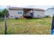 This backyard features a wooden deck, complemented by a well-maintained grassy area at 87 Green Meadows Dr, Taylorsville, NC 28681