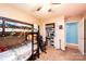 Cozy bedroom featuring a bunk bed, walk-in closet, and neutral décor at 87 Green Meadows Dr, Taylorsville, NC 28681
