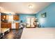 Bright kitchen featuring black tile flooring, an eat-in dining area and white appliances at 87 Green Meadows Dr, Taylorsville, NC 28681