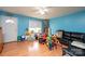 Open Living room featuring a dark leather sectional sofa, and lots of light at 87 Green Meadows Dr, Taylorsville, NC 28681