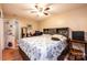Comfortable main bedroom featuring a spacious bed and views of the home at 87 Green Meadows Dr, Taylorsville, NC 28681