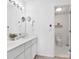 Bright bathroom with double vanity and modern lighting at 9808 Emerald Point Dr # 10, Charlotte, NC 28278
