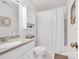 Clean bathroom design featuring coordinated fixtures, vanity and decorative mirrors at 9808 Emerald Point Dr # 10, Charlotte, NC 28278