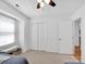 Bright bedroom with ceiling fan, closet and a bench at 9808 Emerald Point Dr # 10, Charlotte, NC 28278