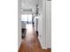 Hallway with view to living room and bar area at 9808 Emerald Point Dr # 10, Charlotte, NC 28278