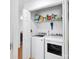 Convenient laundry room with modern appliances and storage at 9808 Emerald Point Dr # 10, Charlotte, NC 28278