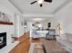 Bright, open living room with fireplace and modern furnishings at 9808 Emerald Point Dr # 10, Charlotte, NC 28278