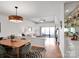 Bright living room with stylish zebra rug, modern bar area, and scenic balcony access at 9808 Emerald Point Dr # 10, Charlotte, NC 28278