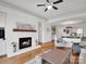 Bright living room showcasing a fireplace and open floorplan at 9808 Emerald Point Dr # 10, Charlotte, NC 28278