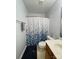 Cozy bathroom with a shower-tub combination and a stylish vanity at 1015 Raywood Ct, Matthews, NC 28104