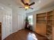 Bedroom with hardwood floors, double door closet, and natural light from the window at 1015 Raywood Ct, Matthews, NC 28104
