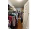 Walk-in closet with ample storage, including shelving and hanging space for clothing and accessories at 1015 Raywood Ct, Matthews, NC 28104