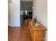 Inviting entryway with gleaming hardwood floors and stylish console table at 1015 Raywood Ct, Matthews, NC 28104