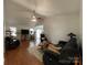 Spacious living room with vaulted ceilings, hardwood floors, and a cozy atmosphere at 1015 Raywood Ct, Matthews, NC 28104