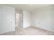 Well lit bedroom with neutral carpet and multiple closets at 115 S Shayna Rd, Troutman, NC 28166