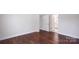 Spacious bedroom with hardwood floors and two open doorways at 115 S Shayna Rd, Troutman, NC 28166