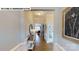 Inviting entryway boasting hardwood floors, elegant trim, and a view into the living spaces at 122 N Shayna Rd, Troutman, NC 28166