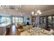 Open-concept living space showcasing modern design with kitchen and dining areas at 122 N Shayna Rd, Troutman, NC 28166