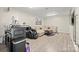 Finished basement featuring a comfortable seating area with a large sectional, a wet bar, and a massage chair at 123 Scotch Irish Ln # 136, Troutman, NC 28166