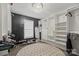 Organized closet with custom shelves, drawers, and ample hanging space, illuminated by a modern chandelier at 123 Scotch Irish Ln # 136, Troutman, NC 28166