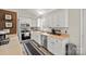 Bright kitchen with modern appliances, ample counter space, and white cabinets at 123 Scotch Irish Ln # 136, Troutman, NC 28166