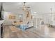 Bright living room with vaulted ceiling, a cozy seating area and open-concept design at 123 Scotch Irish Ln # 136, Troutman, NC 28166
