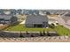 Spacious backyard featuring a mix of lawn and landscaping, with a fence and mature trees, offering a serene outdoor space at 12709 Messenger Row, Huntersville, NC 28078