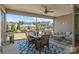 Outdoor seating area with comfortable patio seating with an outdoor grill and a scenic view at 12709 Messenger Row, Huntersville, NC 28078
