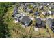 An aerial view showing the house in a beautiful, well-maintained neighborhood with lush green lawns and mature trees at 1274 Fishing Creek Rd # 134, Clover, SC 29710