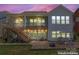 Home featuring an outdoor patio, second story deck, outdoor seating and dining sets, and lush, private landscaping at 1274 Fishing Creek Rd # 134, Clover, SC 29710