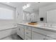 Elegant bathroom with double vanities, soaking tub, and modern fixtures in a bright, stylish space at 1274 Fishing Creek Rd # 134, Clover, SC 29710