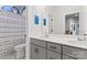 Bright bathroom with double vanity and blue themed shower curtain at 1274 Fishing Creek Rd # 134, Clover, SC 29710