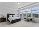 Bright bedroom featuring large windows and a comfortable space, perfect for relaxation and hobbies at 1274 Fishing Creek Rd # 134, Clover, SC 29710