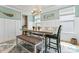 Bright dining room with a table, bench, and stylish lighting, great for Gathering gatherings at 1274 Fishing Creek Rd # 134, Clover, SC 29710