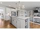 Spacious kitchen featuring an island with granite countertops and stainless steel appliances at 1274 Fishing Creek Rd # 134, Clover, SC 29710