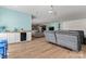 Spacious living room featuring a projector, kitchenette, and comfortable seating area, perfect for entertaining and movie nights at 1274 Fishing Creek Rd # 134, Clover, SC 29710