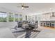 Spacious living room features large windows, hardwood floors, and open layout to the modern kitchen at 1274 Fishing Creek Rd # 134, Clover, SC 29710