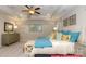 Inviting bedroom featuring a large bed, coordinated decor, and ambient lighting at 130 Fordingbridge Ln, Mooresville, NC 28115